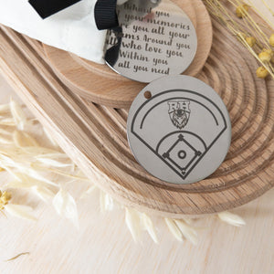 Customizable stainless steel key charm for graduation, featuring a 2-inch diameter and permanent fiber laser engraving. Personalize with text, design, or logo. Ideal as a gift or keepsake.